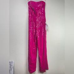 "Hot-Pink Sequins Cover A Scene-Stealing Jumpsuit Designed With A Strapless Sweetheart Neck And Wide Legs." Turn Heads In This Gorgeous Jumpsuit And Live Your Best (Barbie) Life. Currently Retailing For $316 At Dress The Pop And Nordies, Snag Yours Here For Less! New With Tag Size: Xs = 2-4 Brand Says: True To Size. Sweetheart Neck Strapless Optional Straps Included. Lined 92% Polyester, 8% Spandex Dry Clean *Please Inquire For Any Measurements You May Need. *Please Note, Sequins Can Be Carefull Silver Jumpsuits, Black Lace Jumpsuit, Black Lace Romper, Burgundy Jumpsuit, Embroidered Jumpsuit, Evening Jumpsuit, Sequin Rompers, Designer Jumpsuits, Lace Jumpsuit