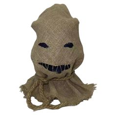 a burlap sack bag with a scary face on the front and bottom part