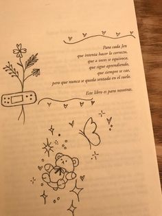 an open book with drawings on the pages and writing in spanish, which includes a teddy bear holding a flower