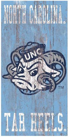 the north carolina tar heels logo on a wooden sign