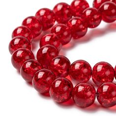 red glass beads on a white background