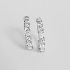 These 3 carat diamond hoops are the perfect size for everyday wear. The .75 inch diameter, adds sparkle from day to night.  Perfect for a night out or with your favorite sweats, amp up your look with these babies.  Set with 24 natural round diamonds G-H color I1 clarity 3.2mm wide for a bold look. Aaa Quality Diamond Hoop Earrings, Diamond White Hoop Earrings Aaa Quality, Dazzling Prong-set Hoop Earrings For Anniversary, White Diamond-accented Small Hoop Earrings, Dazzling Diamond-cut Diamond Hoop Earrings, 3 Carat Diamond, 3 Carat, Accessories Jewelry Earrings, Apparel Accessories