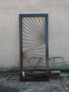 an iron door with a decorative design on it