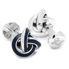 A classic, clean look for a sophisticated gentleman. Beautifully curved knots create the elegant design of our Sterling Blue Enamel Knot Cufflinks. Expertly crafted with high quality sterling silver, these cufflinks have a brilliant shimmer of elegance. A round swivel backing makes this pair easy to dress, easy to style, and easy to pick as your new favorites. The expert craftsmanship of our Sterling Silver cufflinks ensures long-lasting durability and a classic look that is sure to never go out of style. Enamel Cufflinks, Mens Cuff Links, Onyx Cufflinks, Designer Cufflinks, Mens Cufflinks, Mens Cuff, Knot Studs, Classic Wardrobe Staples, Round Logo