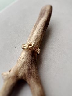 Meet the Parker Ring, a triple stack ring with a super chic top knot. Hypoallergenic All materials are 14k goldfill and with care will last a lifetime. Gold fill is 100x more bonded with gold, unlike plated gold which has a very fine dusting layer. It does not rub off or lose it’s shine and is hypoallergenic. Modern Twist Twisted Jewelry Gift, Twisted Gold Ring For Gift, Gold Spiral Minimalist Stackable Rings, Modern Stackable Jewelry As Gift, Modern Twist Recycled Gold Jewelry For Gift, Modern Twist Recycled Gold Jewelry Gift, Gold Twisted Stackable Jewelry, Adjustable Yellow Gold Stackable Rings With A Modern Twist, Adjustable 14k Gold Jewelry With A Modern Twist