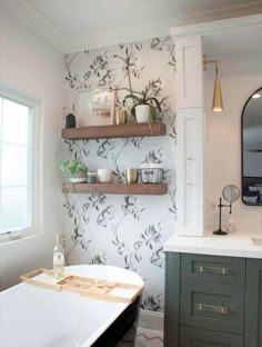 a bath room with a tub and a shelf on the wall next to a sink