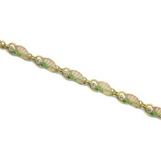 An Art-Nouveau diamond, emerald and enamel bracelet, the nine pink and green enamel links each set with an old European-cut diamond and one round faceted emerald, the diamonds estimated to weigh 0.65 carats in total, all mounted in 18ct yellow gold, bearing import mark for Prague, Former Austro-Hungarian Empire, circa 1890, measuring approximately 18 x 0.7cm, gross weight 16.1 grams. Hallmark 18ct import mark for Prague, Former Austro-Hungarian Empire Art-Nouveau braclet in very good condition, Bracelet Art, Gold Link Bracelet, Austro Hungarian, Emerald Bracelet, Bracelet Design, Enamel Bracelet, Diamonds And Gold, Yellow Gold Bracelet, European Cut Diamonds