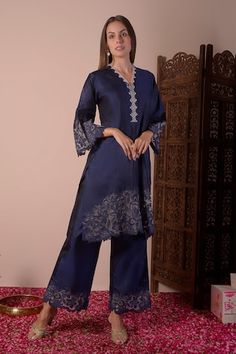 Navy blue kurta with floral cutwork embroidered border. Paired with palazzo. - Aza Fashions Elegant Cutwork Palazzo Set For Eid, Traditional Blue Kurta With Lace Work, Blue Lace Work Kurta For Wedding, Elegant Cutwork Sets For Diwali, Festive Blue Lace Work Sets, Blue Cutwork Kurta For Eid, Festive Blue Kurta With Lace Work, Elegant Diwali Cutwork Sets, Blue Fitted Palazzo Set With Intricate Embroidery