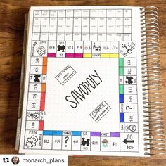 a notebook with the word monopoly written on it