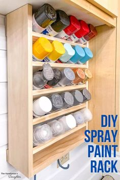 the diy spray paint rack is organized with plastic cups and other items in it