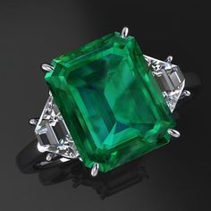 Green Three Stone Emerald Cut Jewelry, Green Three Stone Emerald Cut Emerald Ring, Green Three-stone Emerald-cut Emerald Ring, Three-stone Emerald Cut Green Emerald Ring, Green Emerald Cut Three Stone Emerald Ring, Green Moissanite Emerald Ring With Baguette Cut, Emerald Cut Three Stone Emerald Ring, Green Emerald Ring With Three Stone Baguette Cut, Three-stone Emerald Cut Emerald Ring For May Birthstone