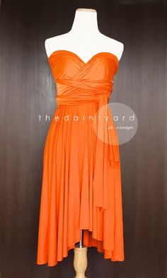 an orange bridesmaid convertible dress for sale on the app store's website