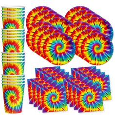 tie - dyed paper plates, cups and napkins are arranged on a white background