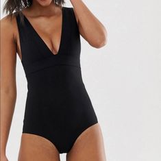 & Other Stories Black V-Neck One Piece Classic Black Swimsuit. Size Small, 8. Brand New With Tag. Hygienic Sticker In Place And Hasnt Been Removed. I Ordered This Directly From & Other Stories And Haven't Worn It. Comes In All Original Packaging. This Is A Beautiful Classic Swimsuit! Swimsuit Featuring A V-Neck, Low Back And Wide Shoulder Straps. Regular Rise Mid Coverage Tags, Pairs Well With: One Piece Swimsuit Swimwear Beach Pool Black Classic V Neck And Other Stories & Other Stories Anthropo Raven Costume, Victoria's Secret Swimwear, Brown One Piece, Pin Up Swimsuit, Free People Swim, Green One Piece, Bathing Suit Cover Up, Black One Piece Swimsuit, Striped Swimsuit