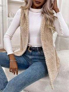 Type:vest \nStyle:Casual \nHem Shaped:Asymmetrical \nNeckline:Hooded \nColor:Khaki \nPattern Type:Plain \nSleeve Length:Sleeveless \nLength:Thigh Length \nFit Type:Regular Fit \nFabric:Non-Stretch \nMaterial:Knitted Fabric \nComposition:100% Polyester \nCare Instructions:Machine wash or professional dry clean \nTemperature:Late Fall (10-17℃/50-63℉) \nPockets:No \nSheer:No \nBody:Unlined \n Casual Winter Coat, Chaleco Casual, Winter Outwear, Winter Vest, Women Coats, Hooded Vest, Vest Coat, Long Sleeves Coats, Warm Outfits