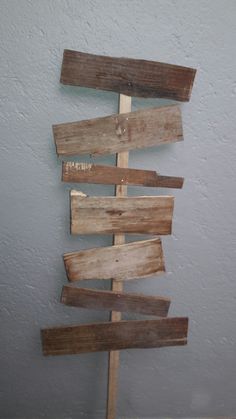 a wooden sign that has been made to look like a christmas tree