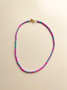 "the \"watermelon sugar\" necklace is a seed bead necklace! it's so cute and it's perfect for layering+summer! not recommended for children under 8 as small objects could present as a choking hazard." Seed Bead Jewelry Ideas, Mens Beaded Necklaces, Preppy Bracelets, Watermelon Sugar, Clay Bracelet