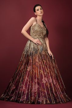 Maroon gown with floral print, heavy sequin embroidery on the flare and jaali work on the yoke. Paired with a bonned petticoat. - Aza Fashions Sleeveless Sequin Gown For Festive Occasions, Sleeveless Sequined Gown For Festive Events, Embellished Multicolor Embroidery Dress For Reception, Festive Semi-stitched Gown With Intricate Embroidery, Wedding Dress With Multicolor Embroidery And Sequins, Semi-stitched Long Gown With Intricate Embroidery, Semi-stitched Multicolor Gown With Resham Embroidery, Multicolor Embroidered Sequin Wedding Dress, Luxury Semi-stitched Gown With Multicolor Embroidery