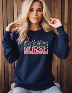 Nurse Sweathirt For Nurse Gift Nurse Clothing Emergency Nurse Sweater Ideal for any situation, a unisex heavy blend crewneck sweatshirt is pure comfort. These garments are made from polyester and cotton. This combination helps designs come out looking fresh and beautiful. The collar is ribbed knit, so it retains its shape even after washing. There are no itchy side seams on these sweaters.  .: Made with a medium-heavy fabric blend of 50% cotton and 50% polyester (8.0 oz/yd² (271.25 g/m this swea Nurse Clothing, Nurse Sweater, Emergency Nurse, Nursing School Gifts, Nursing Hoodie, Emergency Nursing, Nurse Appreciation Gifts, Nurse Sweatshirt, Rainbow Shirt