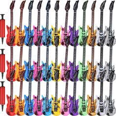 an assortment of electric guitars lined up against a white background, all in different colors