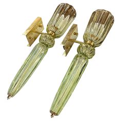 a pair of green glass and gold tone wall sconces, circa 1950's