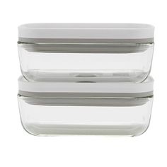 three glass containers stacked on top of each other