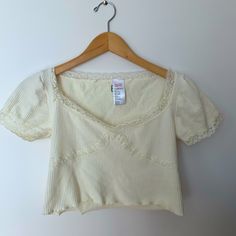 Size Medium/Large Lace Hem And Detailing Never Worn Cute Cream Tops For Loungewear, Cute Cream Loungewear Tops, Cute V-neck Top With Lace Trim, Casual Stretch Tops With Lace Trim, Cute Fitted Cream Tops, Spring Cropped Tops With Ribbed Neckline, Cute V-neck Tops For Loungewear, Fitted Cream Cute Tops, Spring Cotton Crop Top With Ribbed Neckline