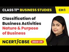 a woman standing in front of a sign with the words class 11 business studies on it