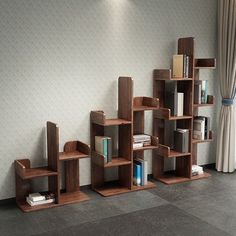 a bookshelf in the corner of a room with several shelves on each side