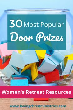 a glass bowl filled with colorful magnets and the words 30 most popular door prizes