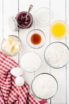 Homemade Raspberry Coconut Bars is a classic dessert and for good reason. Using a jam preserve and coconut flakes, this recipe for dessert bars has a buttery crust and a delicious coconut topping.