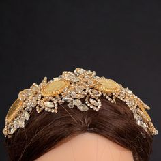 Elevate your look with the Qalunya four coins crystal headpiece. With a luxurious 10 inch length and 3 inch width, this flexible headpiece offers endless styling options. Shorten it to suit your desired look. Perfect for adding a touch of elegance to any outfit. Luxury Gold Ceremonial Headpieces, Traditional Gold Crown Headpiece, Luxury Gold Round Crown Headpiece, Luxury Gold Teardrop Crown Headpiece, Austrian Crown Jewels, Crystal Headpiece, Elevate Your Look, Bridal Sets, 10 Inch