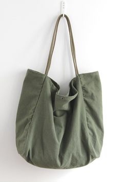 #bag #style #green #tote Versatile Khaki Canvas Bag For Everyday Use, Khaki Shoulder Bag, Everyday Large Capacity Khaki Bucket Bag, Khaki Canvas Tote Bag With Pockets, Khaki Canvas Bag With Removable Pouch, Green Solid Color Travel Shoulder Bag, Everyday Khaki Bag With Pockets, Casual Khaki Hobo Bag For Everyday, Casual Everyday Khaki Hobo Bag