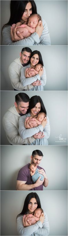 two people are hugging each other while the woman is holding their baby in her arms