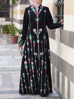 Firdaws Embroidered Abaya Gown Black Thobe With Floral Embroidery And Long Sleeves, Black Long Sleeve Thobe With Floral Embroidery, Fitted Long Sleeve Abaya With Floral Embroidery, Black Long Sleeve Abaya With Floral Embroidery, Black Abaya With Floral Embroidery, Fitted Floral Embroidery Long Sleeve Abaya, Embroidered Long Sleeve Maxi Dress, Fitted Embroidered Long Sleeve Thobe, Fitted Long Sleeve Embroidered Thobe