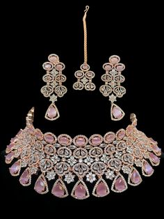 Beautiful diamond choker comes as a full bridal set but can be worn separately for a simple look and is a statement piece for any event. The stones are gorgeous and made of high quality hand work and tikka and jhumka are included with the choker. Perfect for the holidays! It comes in rose gold finish with gorgeous pink stones. Luxury Pink Jewelry For Festive Season, Choker Necklace Set Kundan Pink Heavy, Luxury Wedding Tikka, Luxury Hand Set Tikka For Wedding, Luxury Stone Work Tikka For Reception, Gold Diamond Choker, Indian Reception, Indian Choker, Indian Choker Necklace