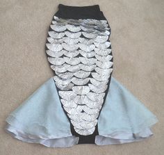 an image of a fish tail skirt on the floor