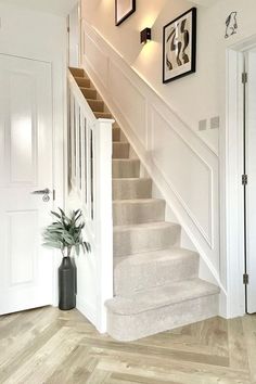 A light and bright hallway with a neutral colour palette. Featuring Cormar Carpet's Easy Clean Primo Plus carpet in the colour Cloudy Bay on the stairs. Hall Stairs And Landing Ideas, Grey And White Hallway, White Hallway Ideas, Stairs And Landing Ideas, Hall Stairs And Landing, Stair Paneling, Landing Ideas, Hall Stairs