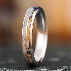 Discover the enchantment of "The Beach Comber" wedding band—a silver ring with genuine Florida sand, abalone shell, and orange spiny oyster shell. Embrace the coastal allure and celebrate your love for the beach. Perfect for the nature-loving woman. Shop now and cherish the beauty of "The Beach Comber" wedding band.
The Beach Comber Silver Ring Features:

SCS certified 100% recycled silver ring base
Florida sand ring inlay

Abalone shell & orange spiny oyster shell ring inlay


Finish: Polis Sea Opal, Ocean Treasures, 10k Gold Ring, Silver Wedding Band, Wedding Clothing, Native American Heritage, Shell Ring, Paua Shell, Silver Wedding Bands