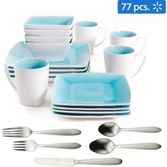 a set of blue and white dishes with cups