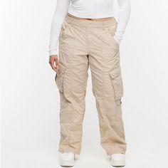 Loose Fit H&M Beige Cargo Pants Size 6 Fitted Full Length Beige Cargo Pants, H&m High Waist Beige Bottoms, Fitted Beige Utility Bottoms, Fitted Beige Bottoms From H&m, Fitted Beige H&m Bottoms, H&m Relaxed Fit Bottoms With Pockets, H&m High-waisted Pants With Pockets, H&m Relaxed Fit Pants With Pockets, H&m High Waist Bottoms With Pockets