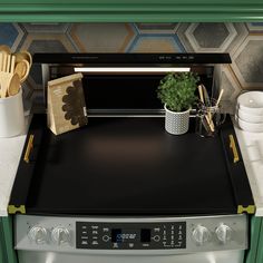 a potted plant sitting on top of an oven with utensils next to it