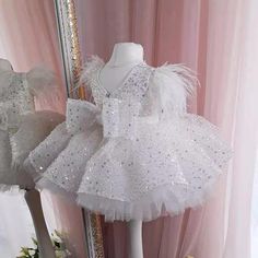 Elevate any special occasion with our Glitter Short Ball Gown Sequins Feather Flower Girl Dress with Bow. The sparkly glitter and delicate sequins will make your little one shine, while the voluminous short ball gown style adds a touch of elegance. Complete the look with the charming bow for a truly enchanting and beautiful ensemble. Tutu Birthday Party, Sequin Flower Girl Dress, Christening Dress, Girl Princess Dress, Birthday Tutu, Birthday Party Dress, Bridal Robes, Gowns With Sleeves, Tutu Dress