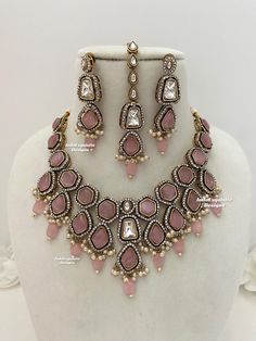 Elegant Bollywood style Victorian Monalisa stones necklace comes with gorgeous Earrings and Tikka/ Indian Jewelry/Premium Quality Polki and Kundan Jewelry/Pink   All items are shipped from Brampton, Ontario, Canada. If you need your item by a certain day, please reach out to us for express delivery option before placing the order so that we can update the shipping for you. Standard shipping/delivery timeline Below are the delivery timeline estimates. We dispatch all orders by the next business day. ---> USA delivery timeline * 3-5 business days to major urban centers in USA. It may take 1-2 days extra to remote locations ---> Canada delivery timeline  * 2-3 business days - GTA  & Montreal  * 2-4  business days - Rest of Ontario/Quebec * 2-6 business days-  Rest of Canada    ---> Europe/Mid Brampton Ontario, Stone Necklace Set, Necklace Set Indian, Kundan Jewelry, Stones Necklace, Bollywood Style, Jewelry Indian, Kundan Jewellery, Buy Handmade