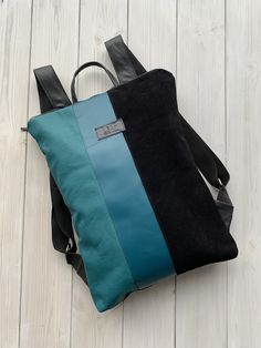 "Ethically made light and comfortable upcycled leather colourful bagpack. Backpack is made from finest leather. I can guarantee that you won't find the same backpack, it's totally one of a kind. Backpack fits 15\" laptop. BACKPACK FEATURES | One zipped and one open pocket inside | Key holder inside | Lining SIZE: 32 x 42 cm (12.6 x 16.5 in) You can choose convertible backpack plus leather purse. Pouch is perfect for your cosmetics, laptop charger or to use it as evening bag. It is made from the Reworked Bag, Backpack Fits, Soft Leather Backpack, Convertible Backpack Purse, Backpack Gift, Red Backpack, Minimalist Backpack, Upcycled Leather, Leather Backpack Purse