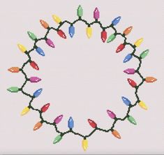 a cross stitch christmas wreath with colorful lights