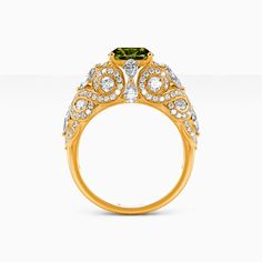 a yellow gold ring with green and white diamonds