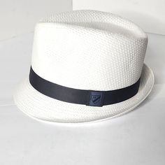 Solid Band Small Brim Fedora Silhouette Straw Cotton Fabrication Spot Clean New With Tags Casual White Flat Brim Fedora, White Adjustable Panama Hat Casual Style, Casual White Panama Hat With Short Brim, Casual Adjustable White Panama Hat, Casual White Adjustable Panama Hat, Casual White Brimmed Fedora, White Fitted Casual Hat, Casual White Fedora, Beach Bucket Hat