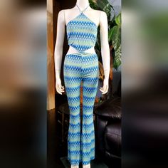 New With Tag, Beautiful Sexy Halter Jumpsuit , Blue, Green, Yellow Geometric Pattern. Bodycon Stretchable. Bell Bottom . From A Non-Smoking Home. Bundle For A Discount And Save Shipping. #Summer #Jumpsuit #Bodycon Trendy Fitted Jumpsuits And Rompers For The Beach, Trendy Fitted Backless Jumpsuits And Rompers, Casual Fitted Halter Neck Jumpsuits And Rompers, Trendy Fitted Backless Jumpsuit, Trendy Fitted Set With High Waist, Trendy Fitted Halter Neck Jumpsuits And Rompers, Blue Fitted High-waist Sets, Trendy Fitted Halter Neck Jumpsuit, Fitted High Waist Two-piece Pants Set