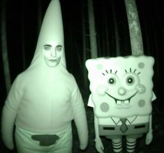 two people in costumes standing next to each other